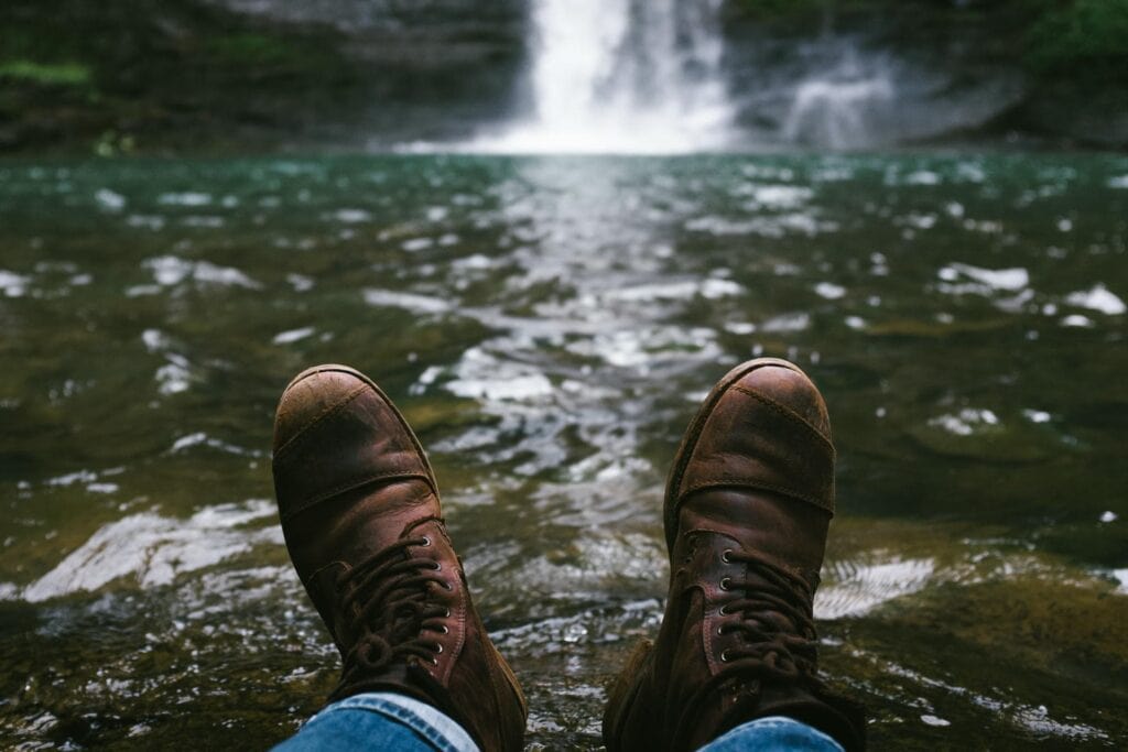 Person finding peace by a waterfall during fentanyl addiction treatment in Lawrenceville.