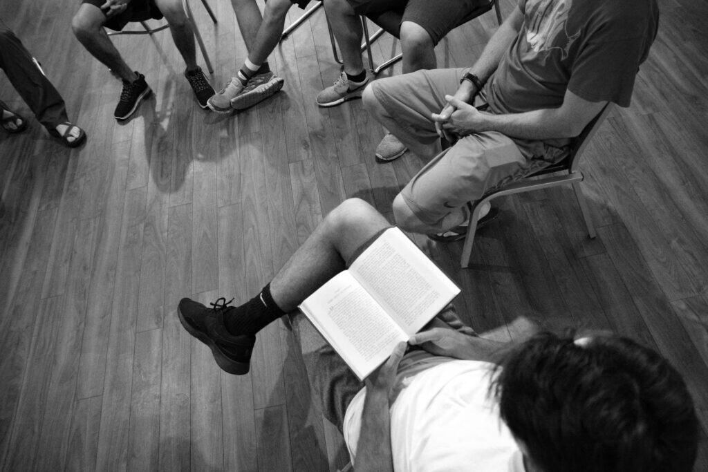 Men participating in group discussion during rehab near Alpharetta GA session