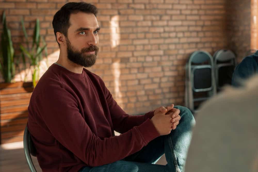 People participating in a psychological therapy support group during anxiety treatment in Georgia.