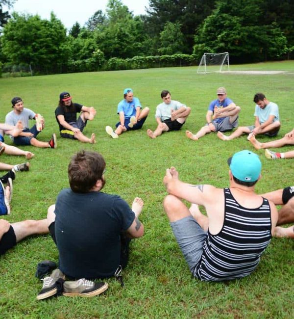 Clients sitting together outside during group therapy at a rehab near Lilburn, GA.